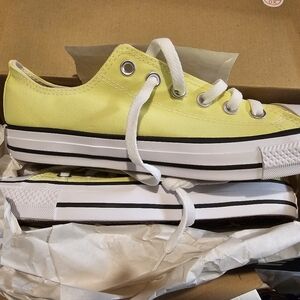 Yellow converse shoes